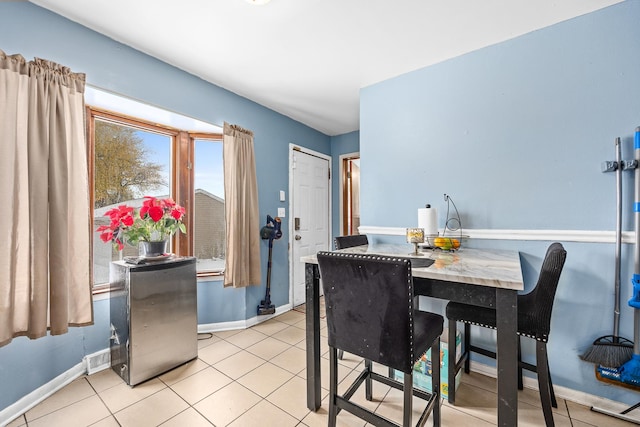 456 E 170th St, South Holland, IL 60473 - dining room featuring baseboards and light tile patterned floors