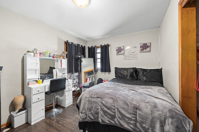 bedroom featuring dark hardwood / wood-style floors