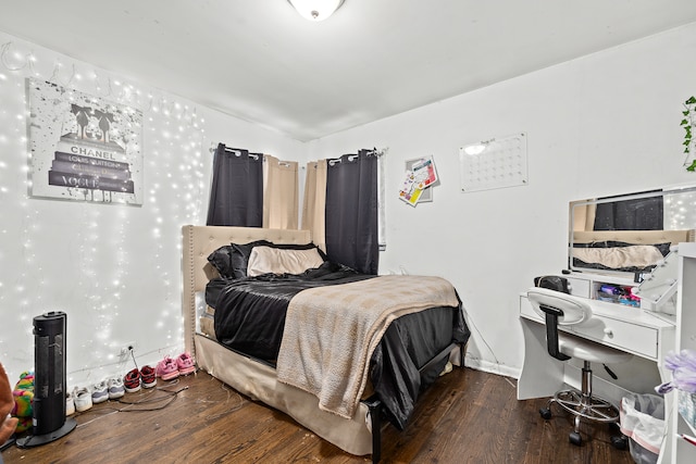 bedroom featuring dark wood-type flooring