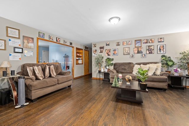 living room featuring dark hardwood / wood-style floors