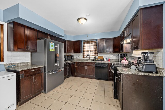 456 E 170th St, South Holland, IL 60473 - kitchen with black appliances, light tile patterned floors, a sink, and backsplash