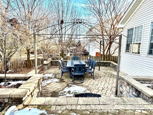 view of snow covered patio