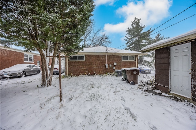 view of yard layered in snow