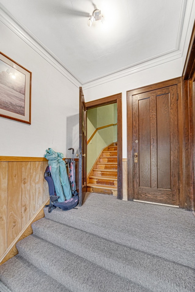 stairs featuring ornamental molding