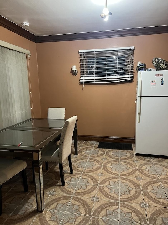 tiled dining area with ornamental molding