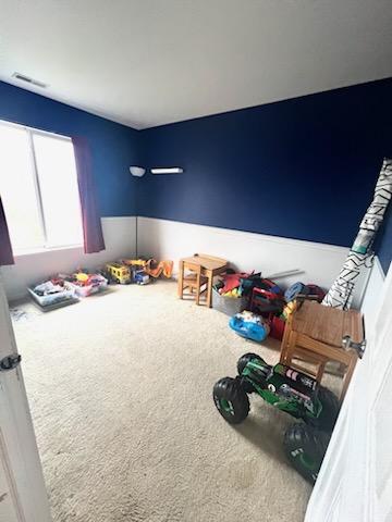 playroom featuring carpet flooring