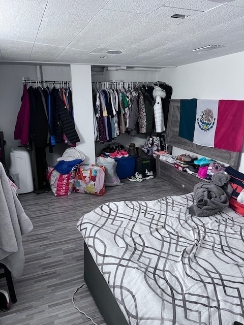 bedroom featuring hardwood / wood-style flooring