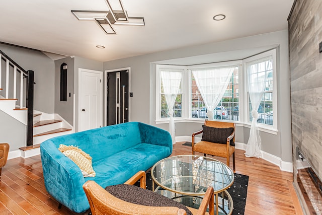 living room with light hardwood / wood-style flooring