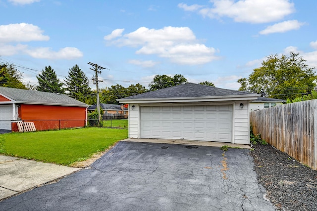 garage with a yard