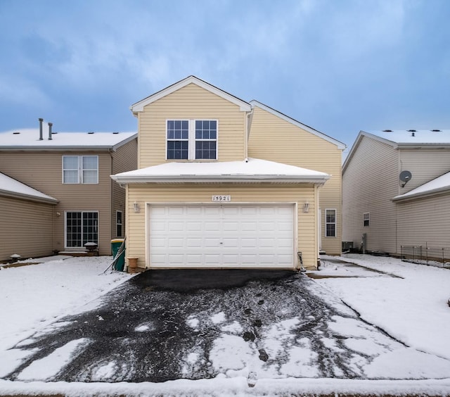 view of snow covered garage