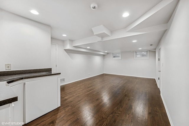 interior space with dark hardwood / wood-style floors