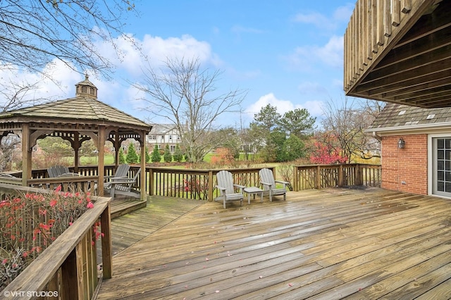 wooden deck with a gazebo