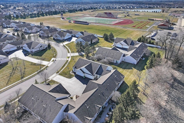 bird's eye view featuring a residential view and a water view