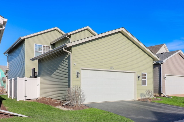 view of property exterior featuring a garage