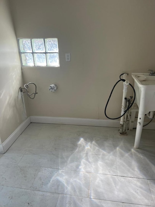 bathroom featuring baseboards