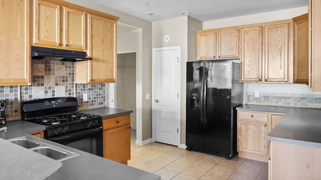 kitchen featuring light brown cabinets, black appliances, sink, light tile patterned floors, and tasteful backsplash