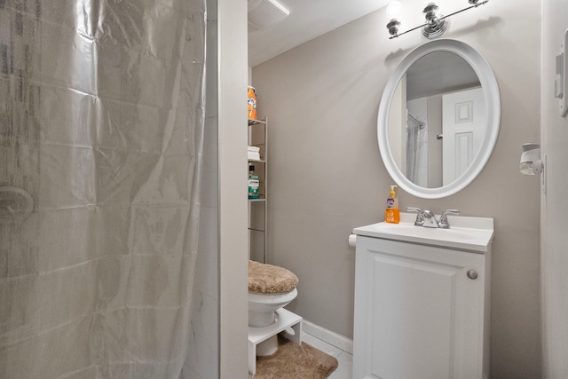 bathroom featuring a shower with shower curtain, vanity, toilet, and tile patterned flooring