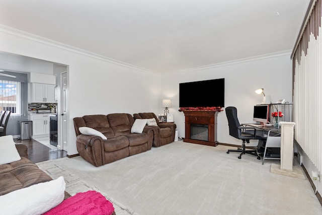 living room featuring crown molding, beverage cooler, and light carpet