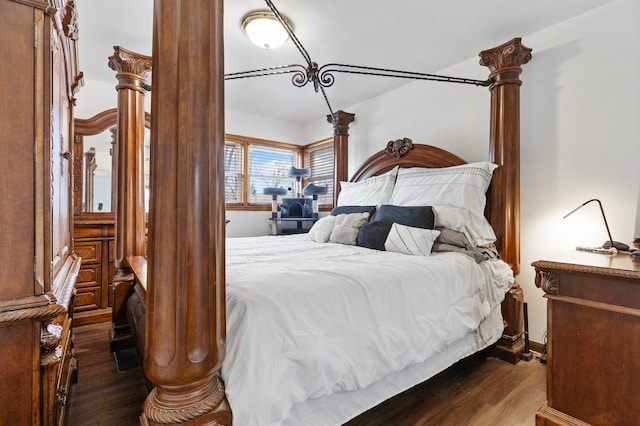 bedroom featuring dark wood-type flooring