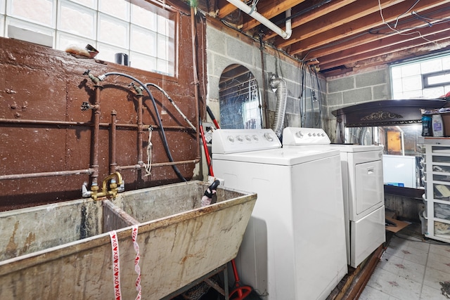 laundry area with washing machine and clothes dryer