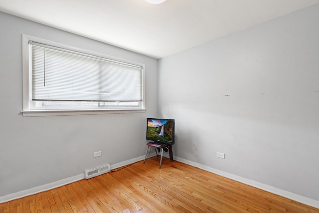 empty room featuring light hardwood / wood-style floors