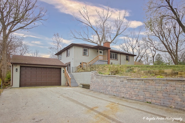 view of front of property with a garage