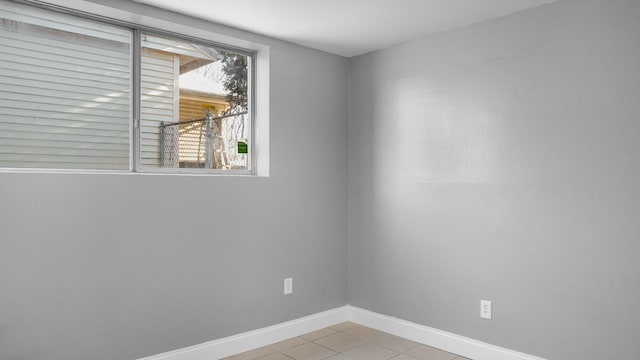 view of tiled spare room