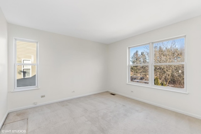 view of carpeted spare room