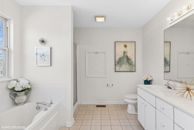 full bathroom with tile patterned floors, vanity, separate shower and tub, and toilet