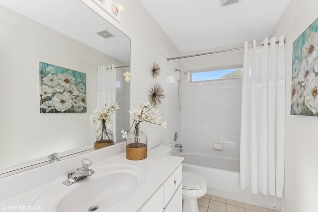 full bathroom featuring tile patterned floors, vanity, toilet, and shower / bathtub combination with curtain