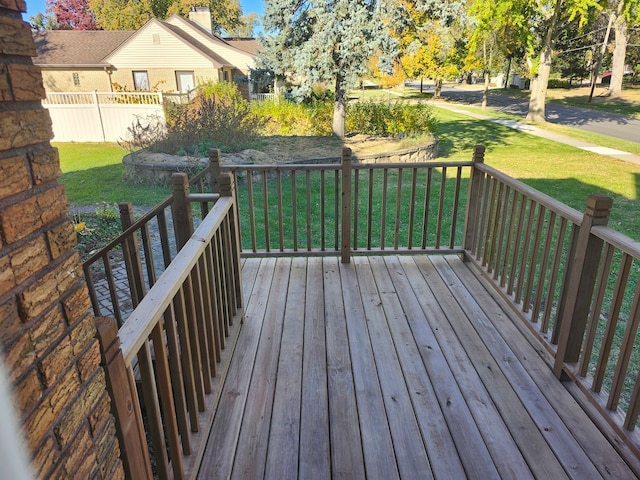 deck featuring a lawn