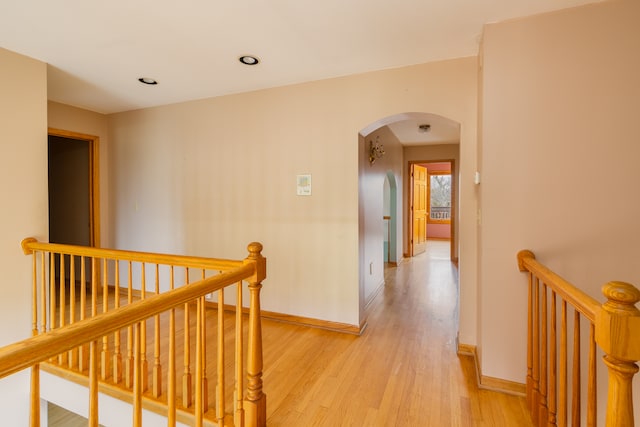 hall with light hardwood / wood-style flooring