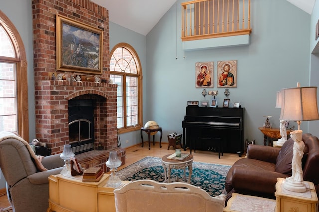 living room with wood-type flooring, vaulted ceiling, and a brick fireplace