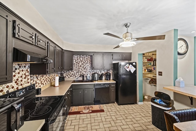 kitchen featuring decorative backsplash, extractor fan, ceiling fan, sink, and black appliances