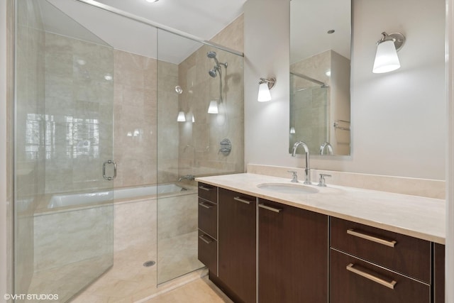 bathroom with vanity and a shower with shower door