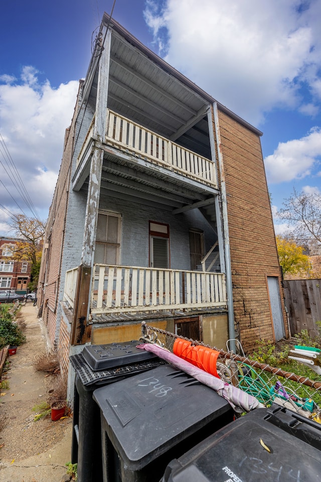 exterior space featuring a balcony