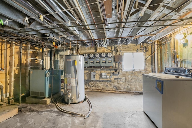 1351 N Campbell Ave, Chicago, IL 60622 - below grade area featuring gas water heater and washer / dryer