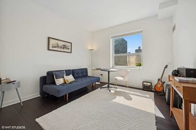 living room featuring dark hardwood / wood-style floors