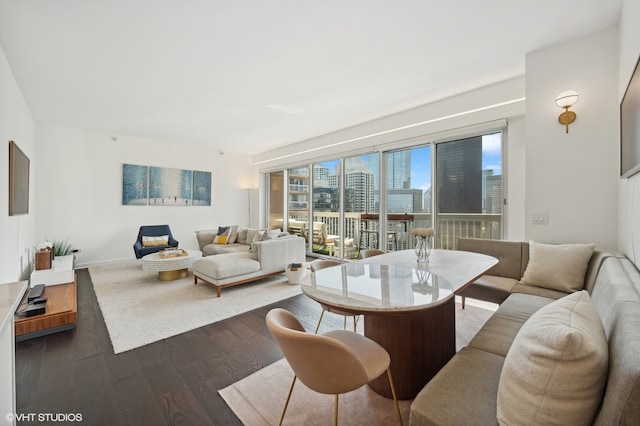 living room with dark hardwood / wood-style floors