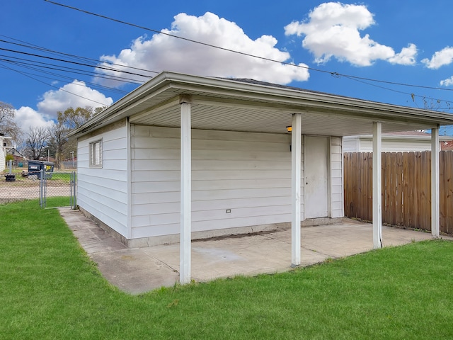 view of outdoor structure with a lawn