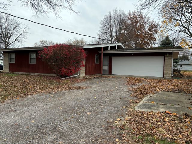 ranch-style home with a garage