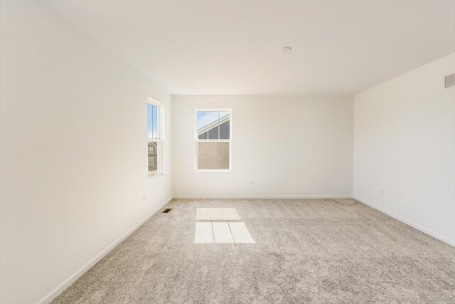 bedroom featuring crown molding, light colored carpet, vaulted ceiling, and a notable chandelier