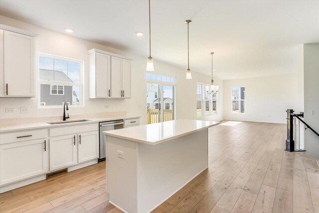 kitchen with stainless steel appliances, dark hardwood / wood-style flooring, backsplash, decorative light fixtures, and a kitchen island