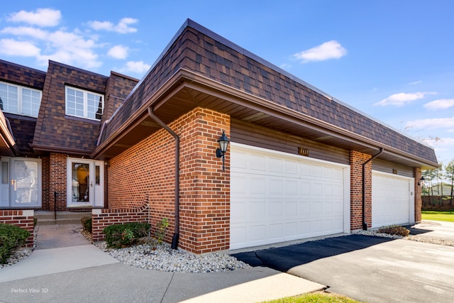 exterior space featuring a garage