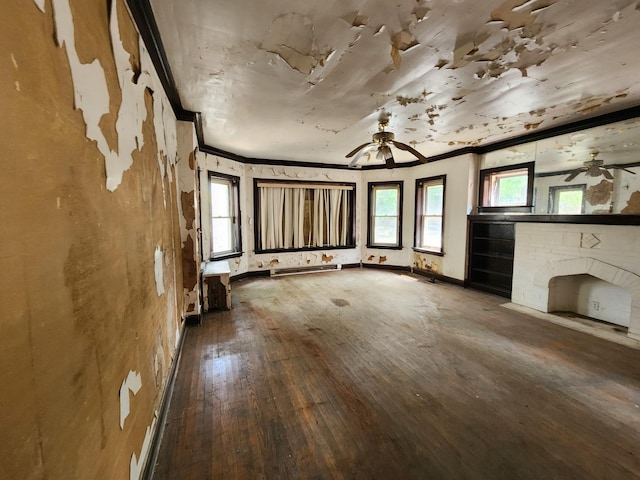 7952 S Langley Ave, Chicago, IL 60619 - unfurnished living room with crown molding, a ceiling fan, hardwood / wood-style floors, a baseboard heating unit, and a fireplace with flush hearth