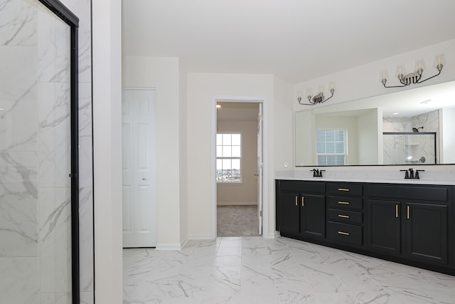 bathroom featuring vanity and a shower with shower door