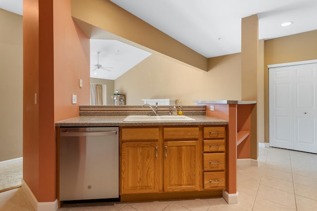 kitchen with vaulted ceiling, brown cabinetry, ceiling fan, dishwasher, and a sink
