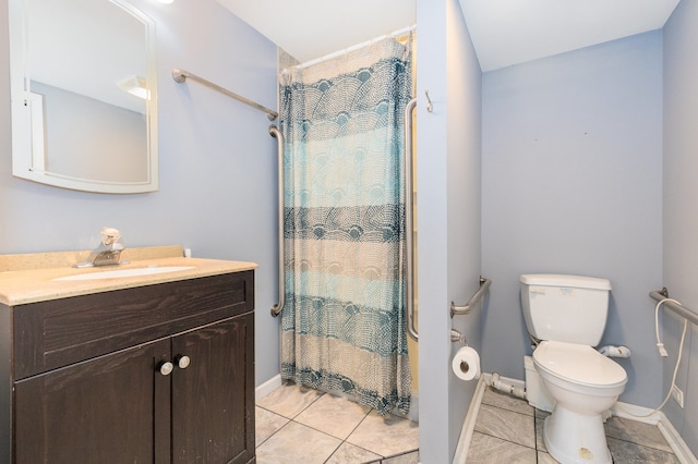 bathroom with tile patterned floors, vanity, toilet, and a shower with curtain