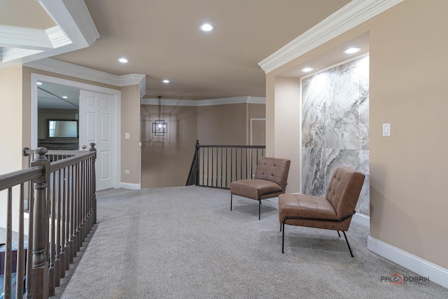 sitting room featuring crown molding, baseboards, carpet floors, an upstairs landing, and recessed lighting