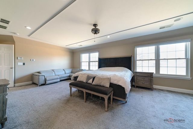 carpeted bedroom with recessed lighting, baseboards, and visible vents